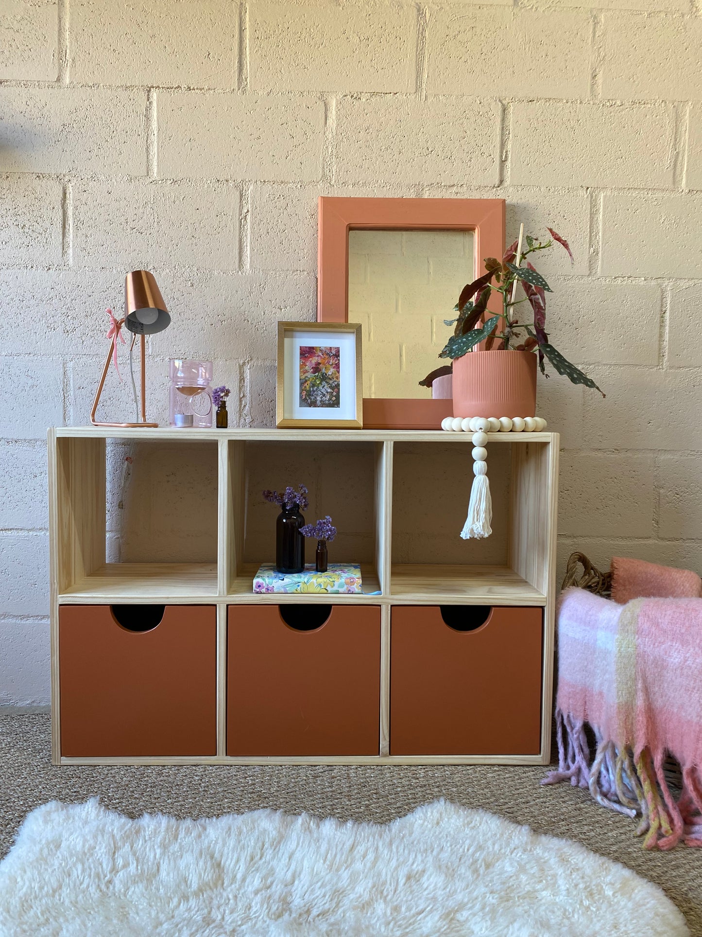Handcrafted 8 Cube Storage Unit with Copper Storage Boxes by Grandpa's Workshop styled in a playroom