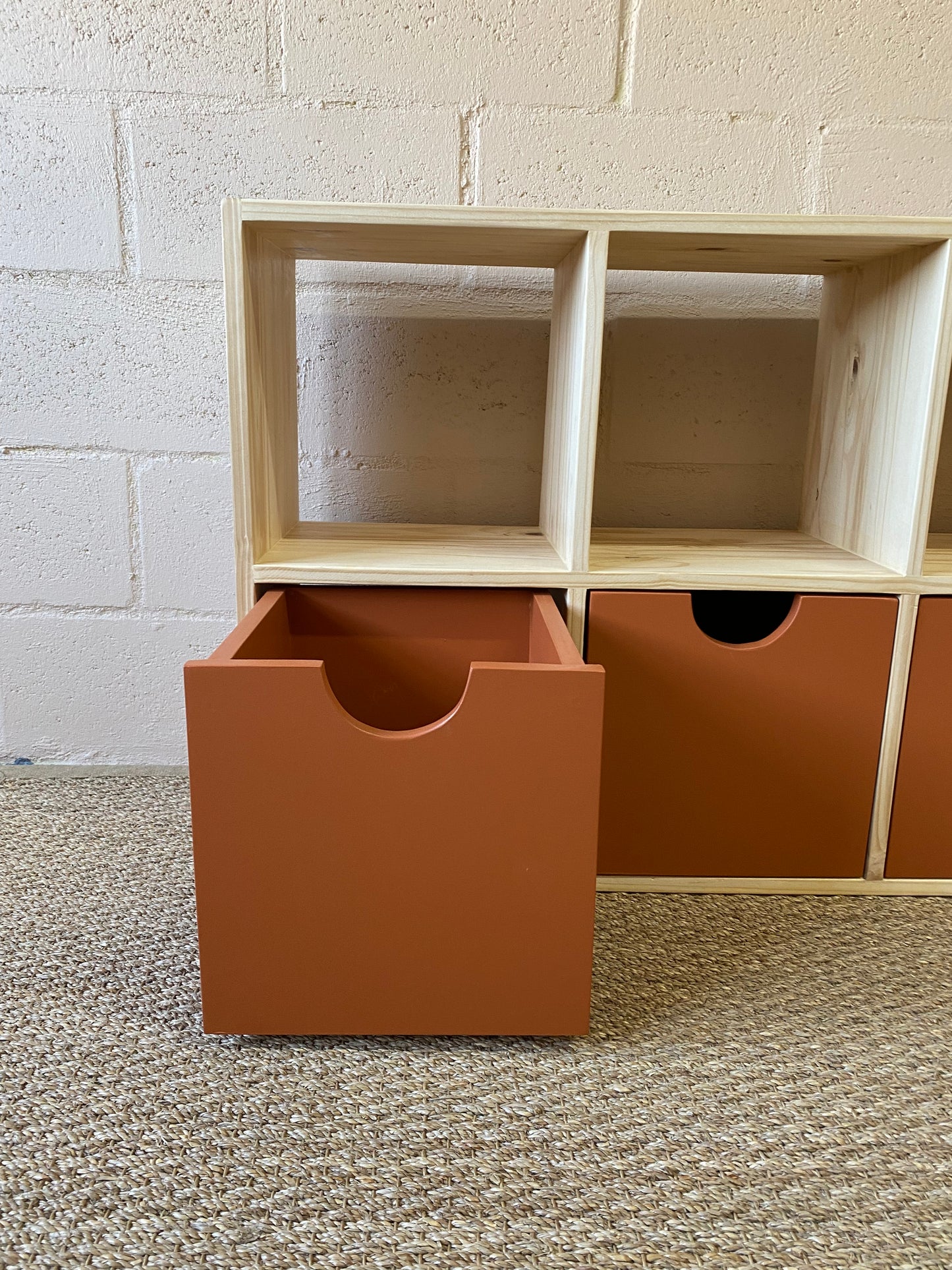 Copper storage box mounted on smooth-gliding sliders for easy access and tidy-up time