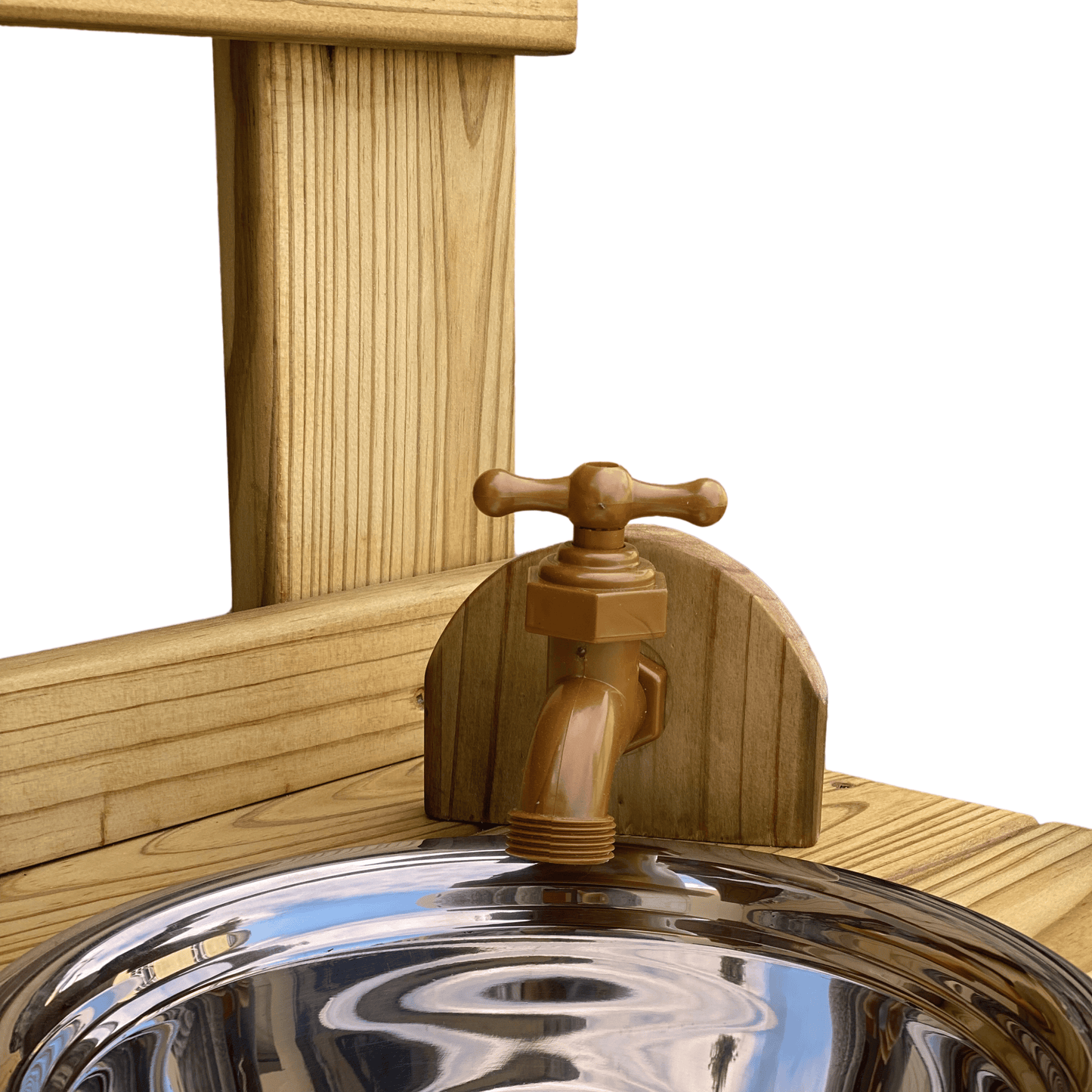 Close-up of handcrafted wooden tap and stainless-steel bowl on the Double Mud Kitchen, built for creative outdoor play.