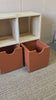 Video showcasing smooth-gliding Copper storage boxes opening and closing within a handcrafted cube storage unit