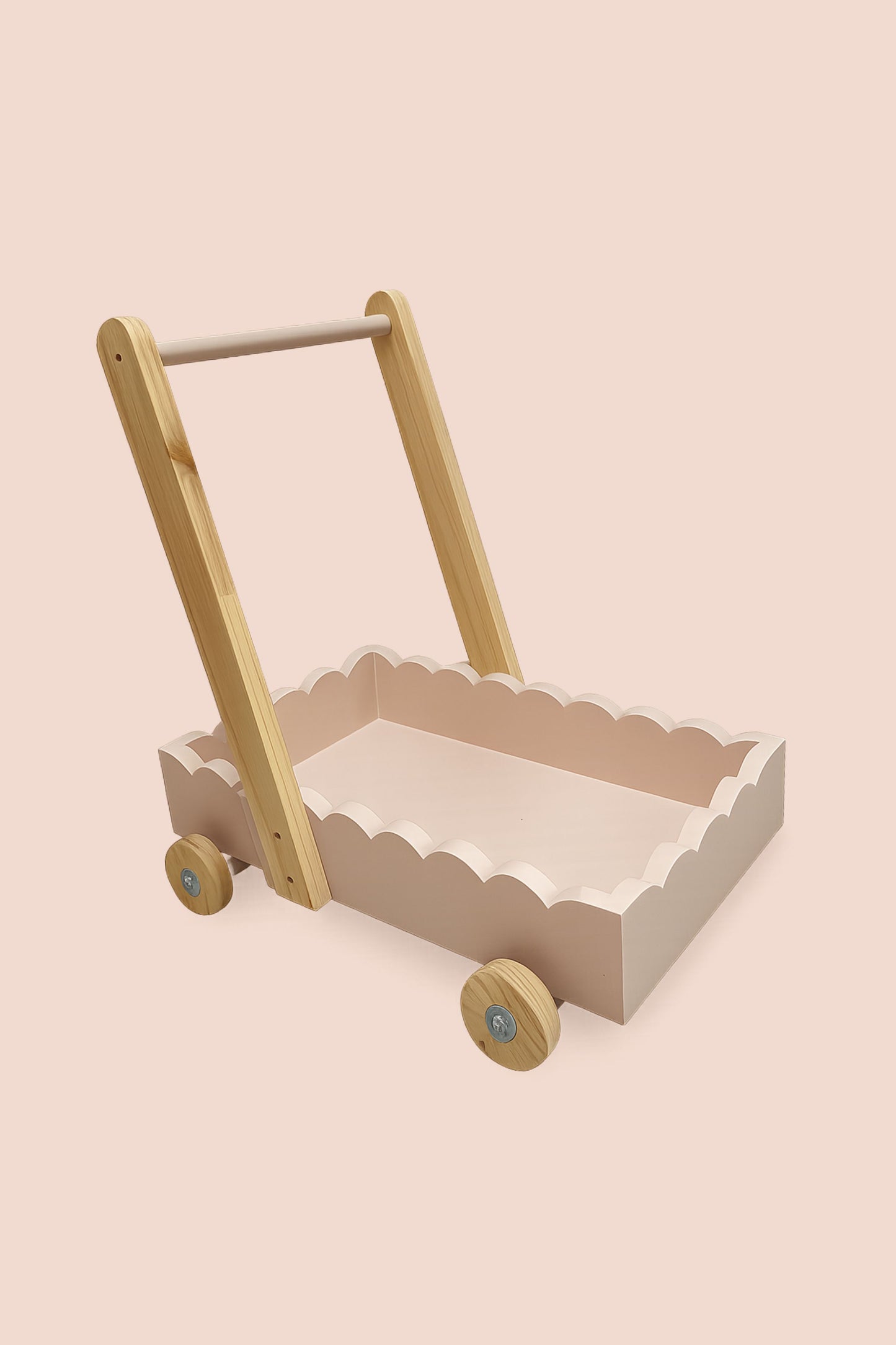 Scalloped wooden baby push walker in blush linen finish with natural wood handle and wheels on a neutral background