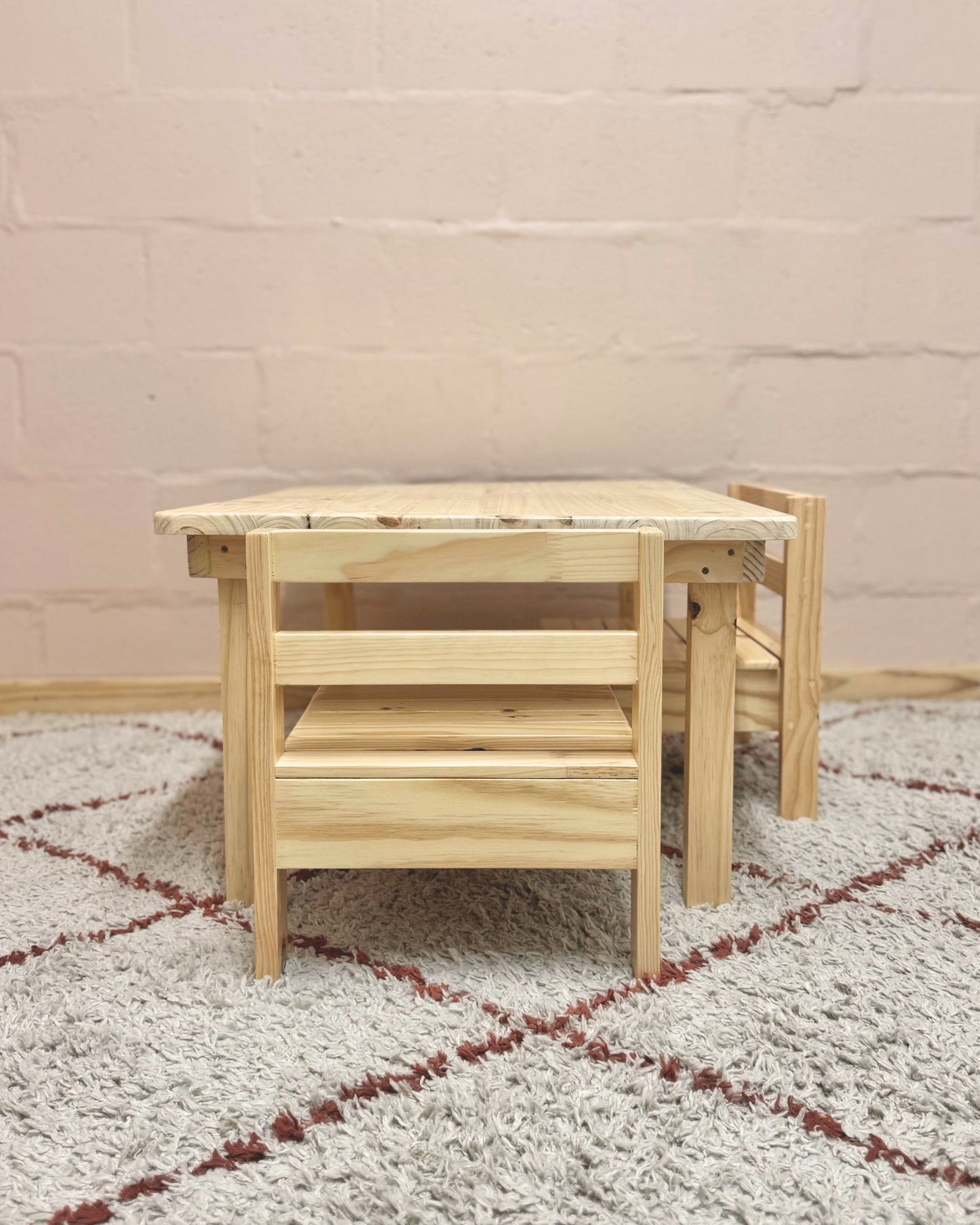 Compact wooden toddler table and chair set with two chairs, ideal for small spaces and playrooms